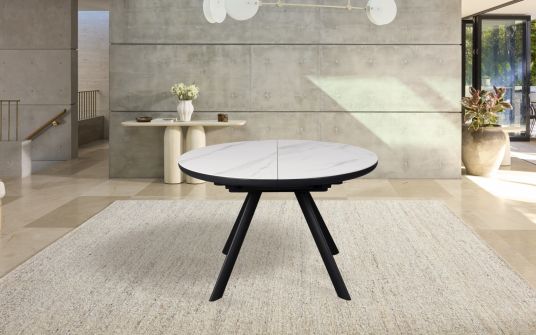 Orbit round extendable dining table