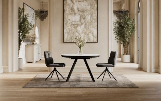 Orbit round extendable dining table