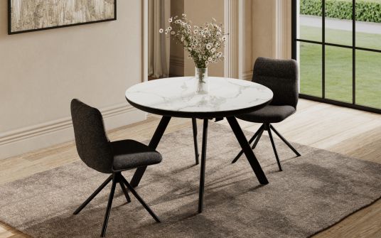 Orbit round extendable dining table
